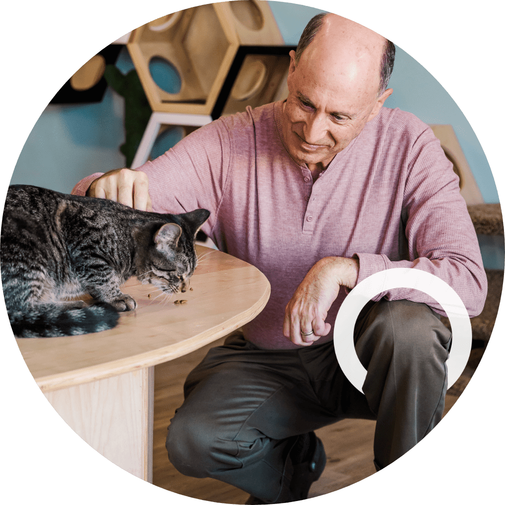 Mark, a real CIDP patient, with his cat.