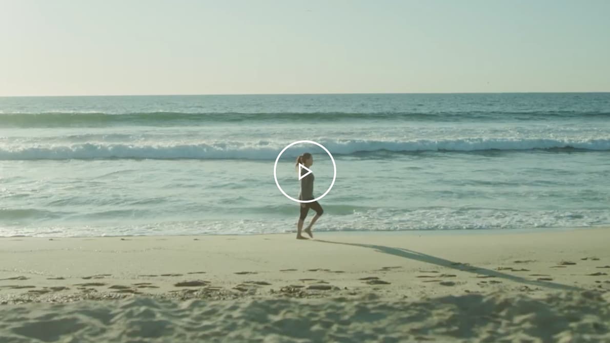 A video thumbnail of Jen, an MMN patient walking on the beach.